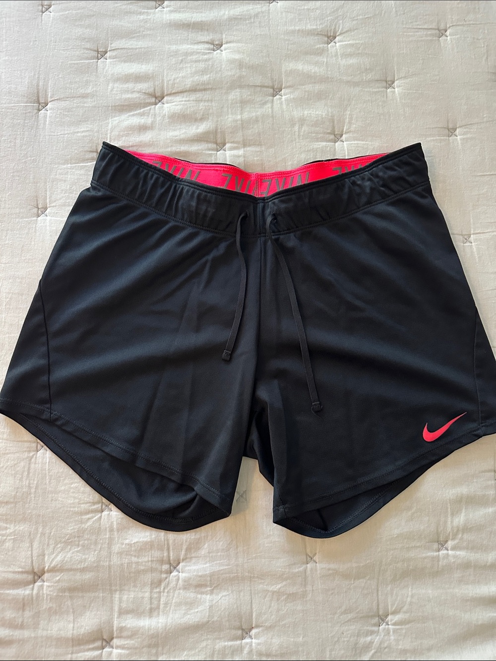 Nike Black Women's Athletic Shorts with Pink Trim